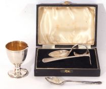 Mixed Lot: comprising a Chester hallmarked silver baby's spoon and food pusher, a Birmingham