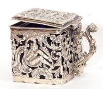 aVictorian silver condiment pot of square form with hinged lid, the pierced body decorated with