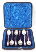 Cased set of six late Victorian silver tea or coffee spoons decorated with shell finials, London