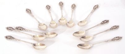 Eleven Edward VII silver tea or coffee spoons with delicate pierced floral ends, London 1903,