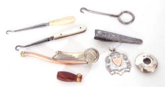 Mixed Lot: assorted wares comprising a small silver fob, button hooks, silver plated dressing