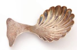 George V silver caddy spoon, the handle decorated with floral detail and bowl formed as a shell,