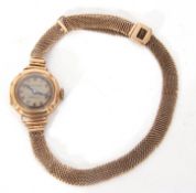 Second quarter of 20th century ladies hallmarked 9ct gold cased wrist watch by Vertex, having