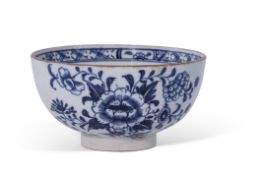 Large Lowestoft tea bowl decorated in underglaze blue with a floral design, 9cm diam