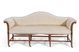 Edwardian Georgian style painted satinwood three-seated hump-back sofa on eight tapering square legs