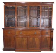 Late Georgian mahogany break front secretaire bookcase/cabinet having four astragal glazed doors