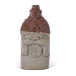 Brampton (Oldfield Pottery) flask moulded as a man on a barrel with the title "Old Tom", impressed