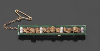 Antique enamel and pearl set open work brooch of elongated rectangular form, a bud and leaf design