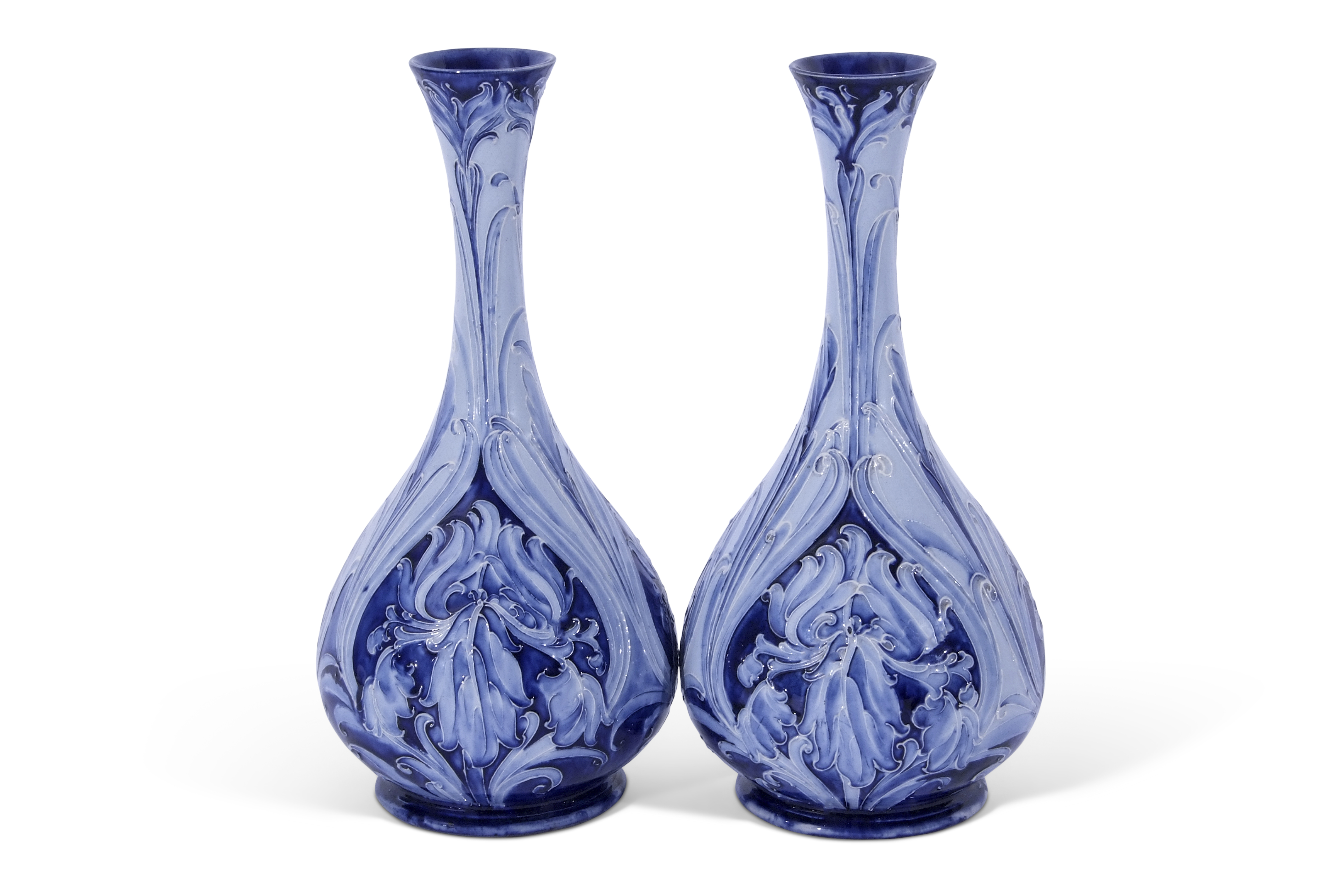 Good pair of early Moorcroft Florian ware vases, the pear shaped bodies with tube lined floral