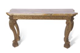 20th century carved giltwood large console table with heavy shaped marble top, supported on four
