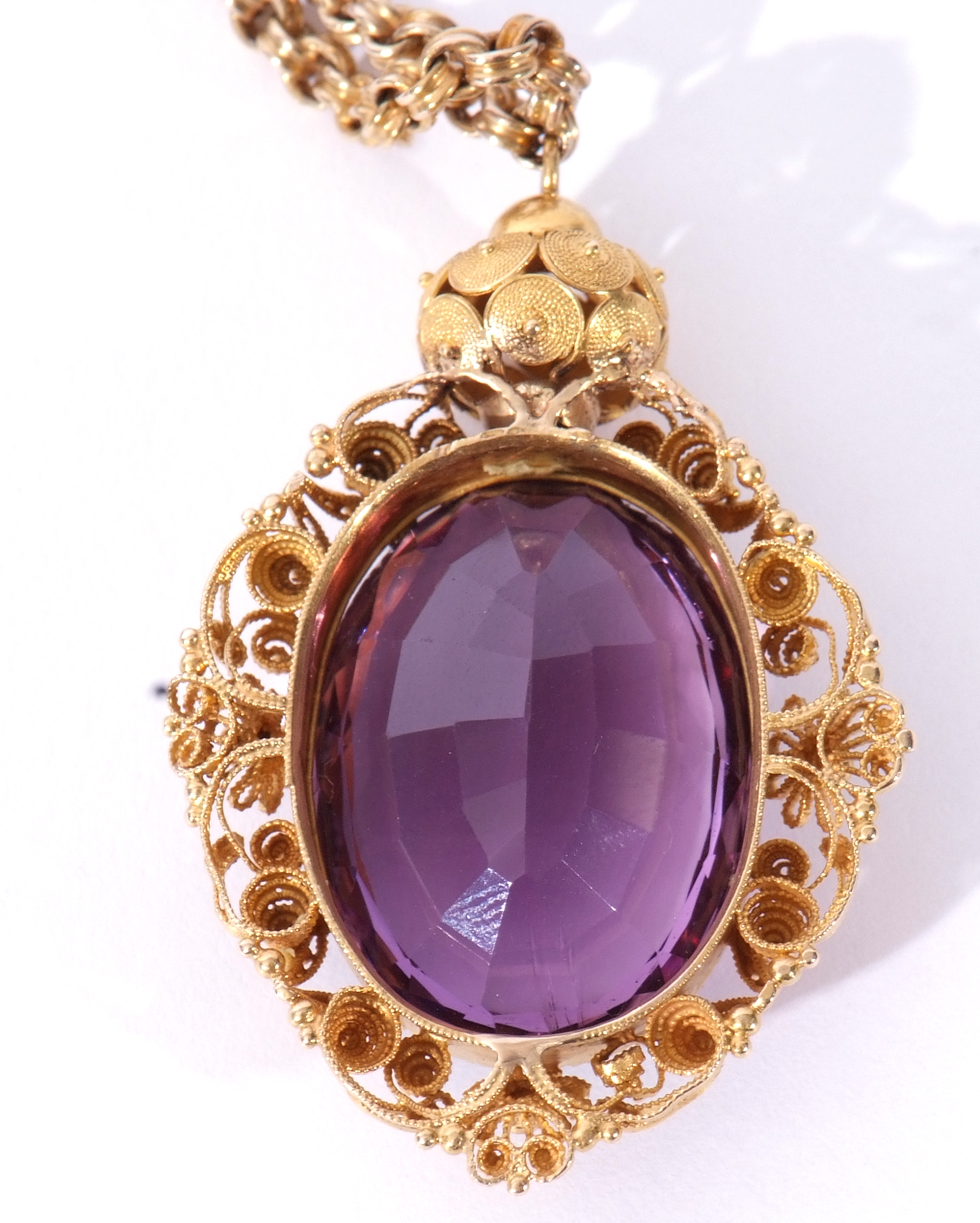Antique amethyst pendant and chain, the oval faceted amethyst, 22 x 14mm, in an ornate Etruscan - Image 3 of 7