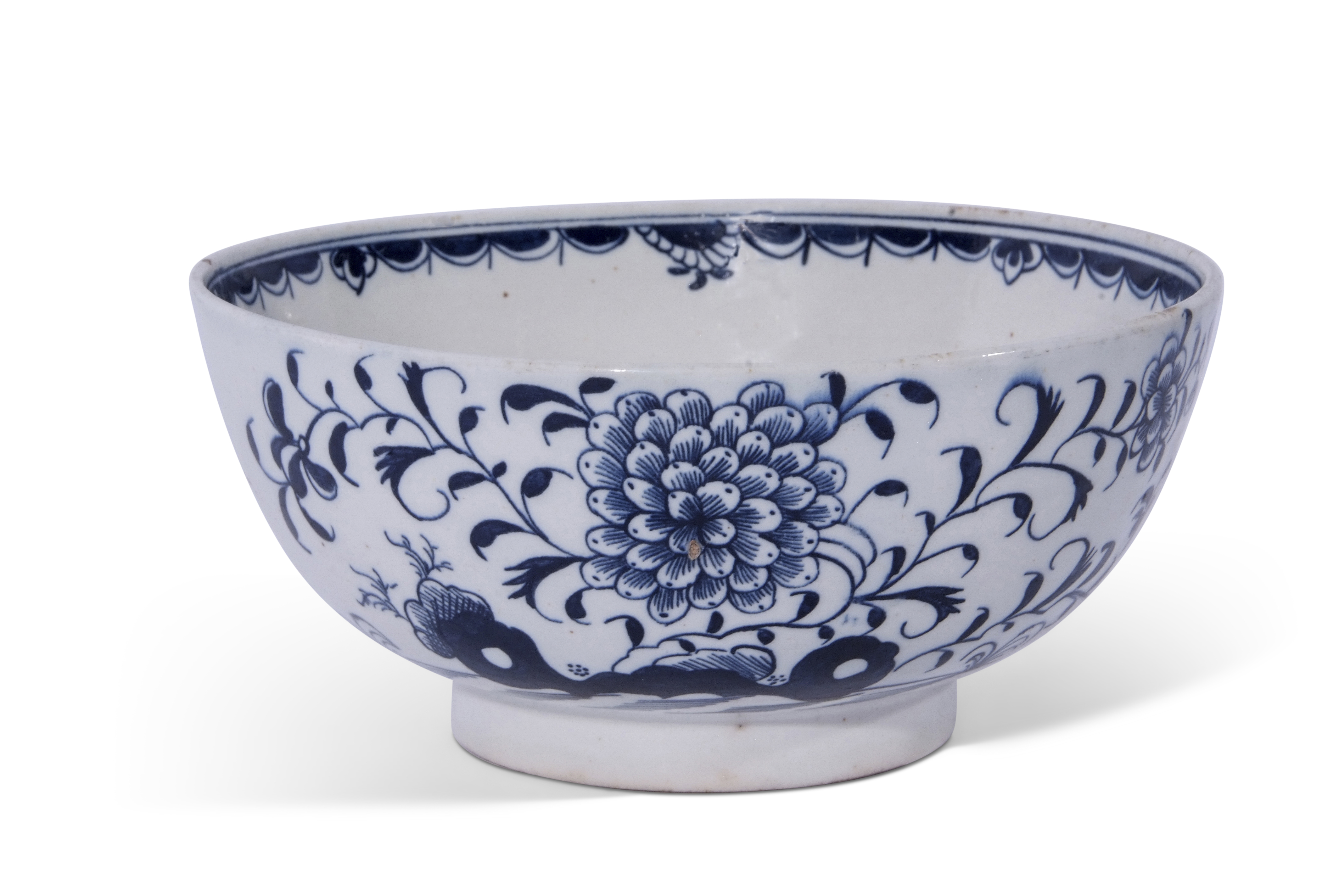 Lowestoft porcelain slop bowl decorated in underglaze blue with trailing plants and flowers, 15cm