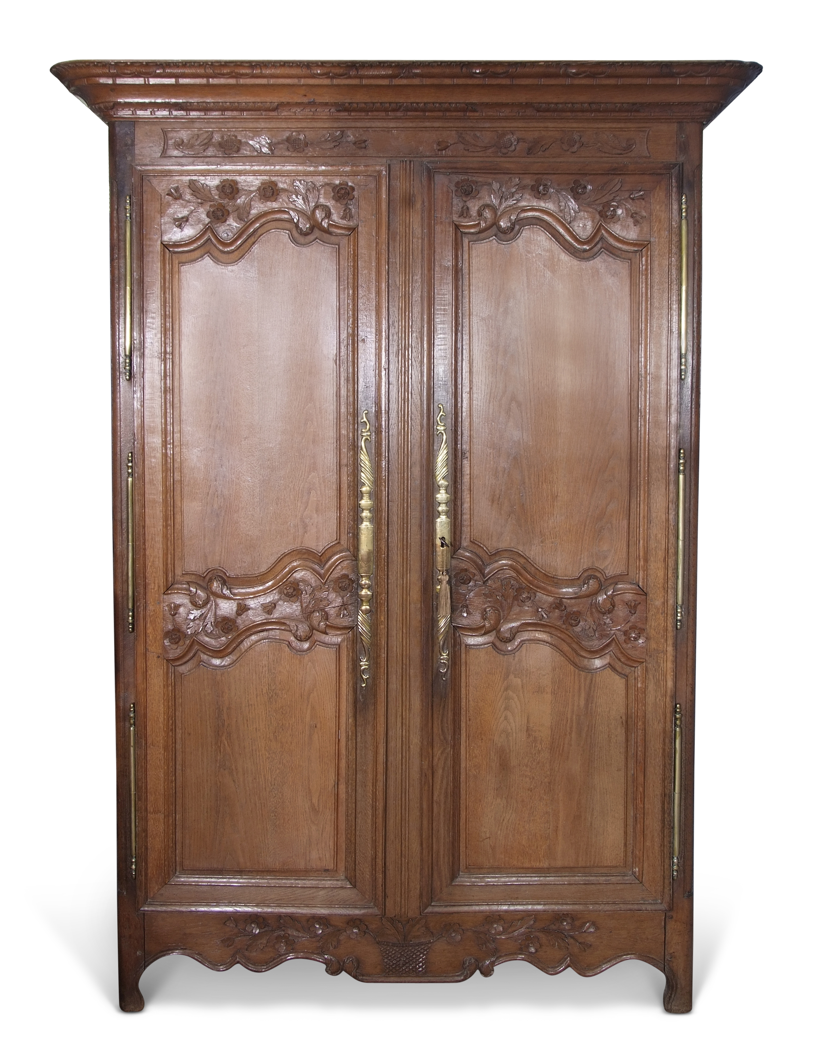 Late 18th/early 19th century carved walnut French armoire with carved cornice and frieze above two