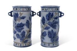 Important pair of Bailey Fulham cylindrical vases, the grey ground with relief design of blue