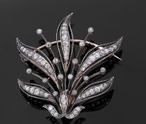 Antique "Child & Child" diamond spray brooch, circa 1900, an open work foliate design set throughout