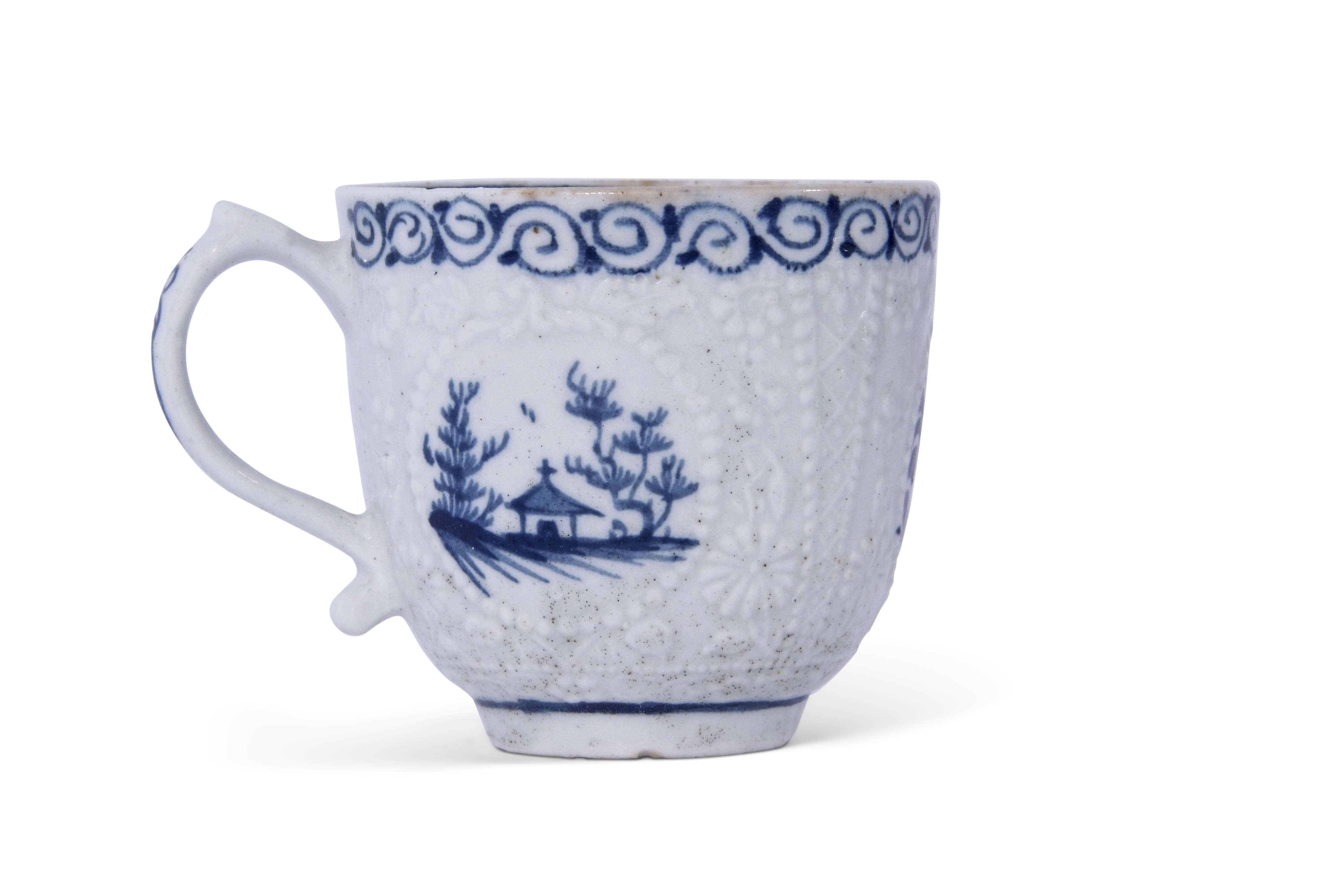 Early Lowestoft porcelain cup, the body moulded with lattice and flower heads encompassing blue