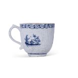 Early Lowestoft porcelain cup, the body moulded with lattice and flower heads encompassing blue