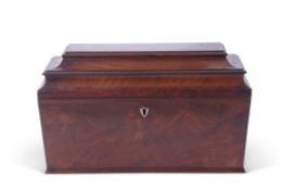 Georgian mahogany sarcophagus formed tea caddy, the hinged lid opening to an interior with two