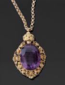 Antique amethyst pendant and chain, the oval faceted amethyst, 22 x 14mm, in an ornate Etruscan