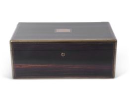 Victorian coromandel and brass bound writing slope of hinged rectangular form, the interior with