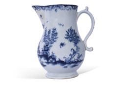 Large Lowestoft jug painted in underglaze blue with a pagoda and flowering plants with river scene