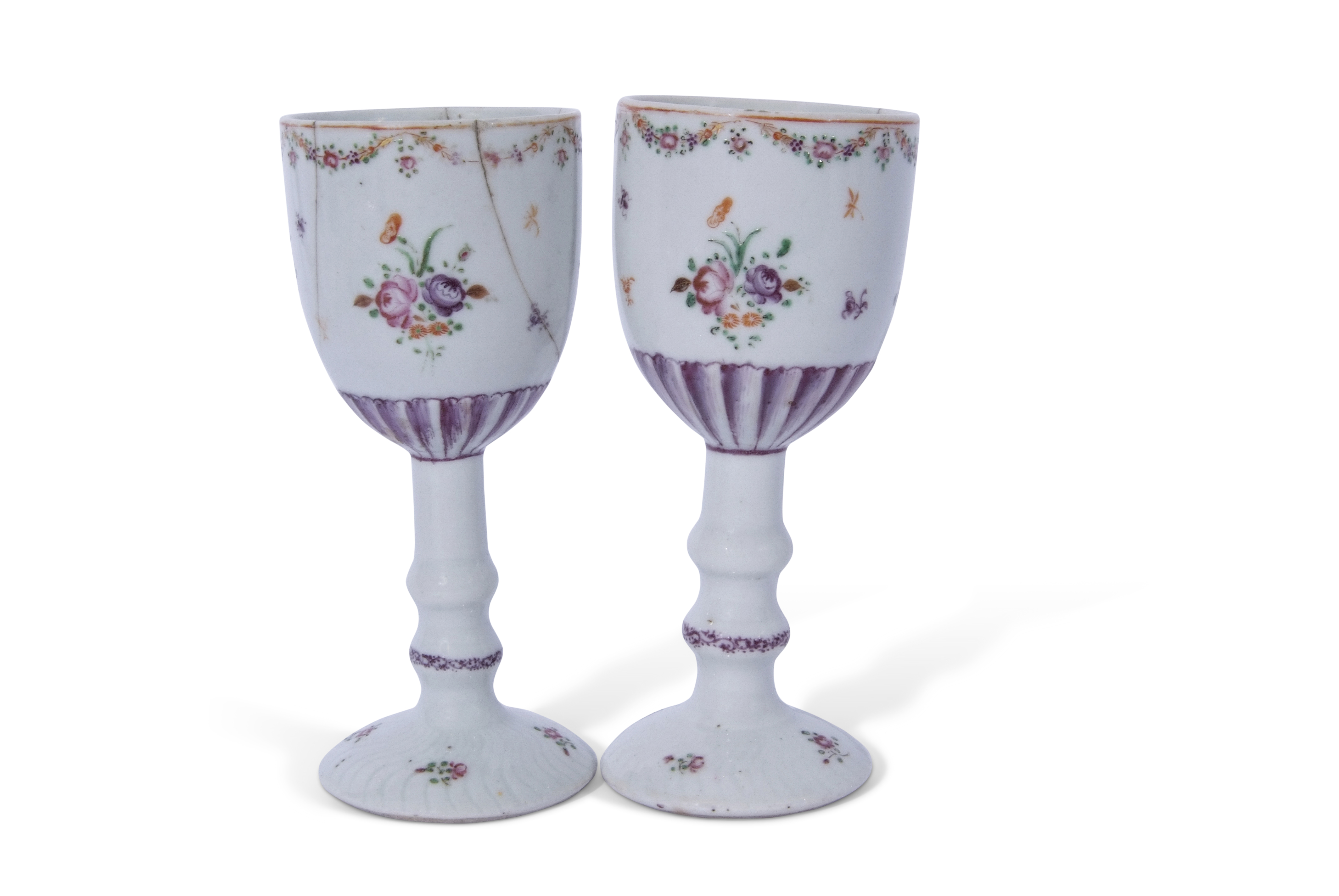 Rare pair of 18th century Chinese export stem cups or wine cups with floral design to bowl above a