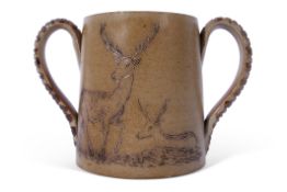 Smith & Co salt glazed two handled mug or tyg, with incised decoration of deer and antelope verso,