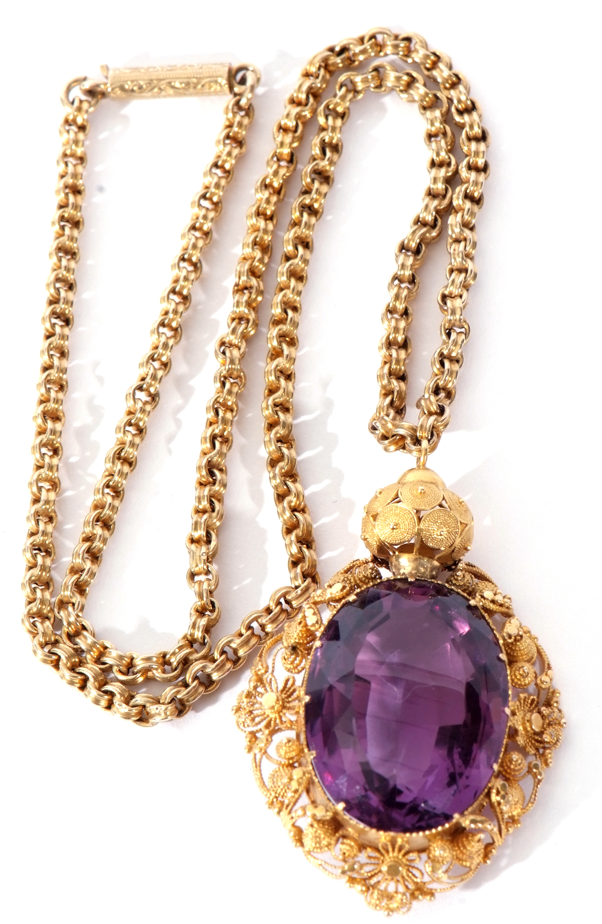 Antique amethyst pendant and chain, the oval faceted amethyst, 22 x 14mm, in an ornate Etruscan - Image 2 of 7