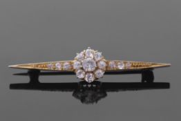 Early 20th century diamond cluster brooch, the flowerhead set with graduated old cut diamonds,