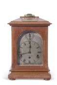 S B Cooper, E. Dereham, early 20th century mahogany cased bracket clock, the architectural case with