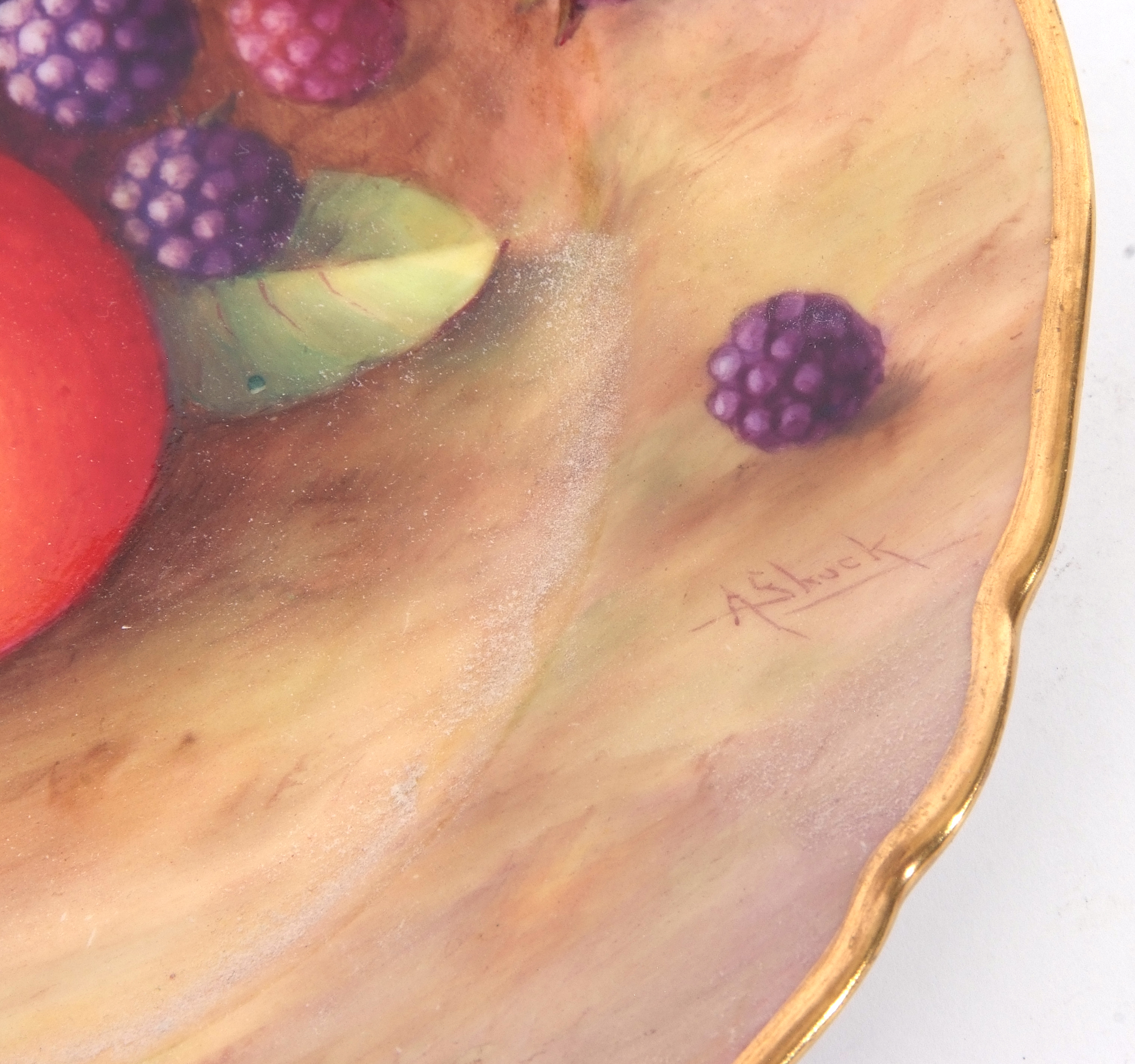 Royal Worcester vase decorated with fruit within a shaped gilt rim, signed by A Shuck, 22cm diam - Image 2 of 2