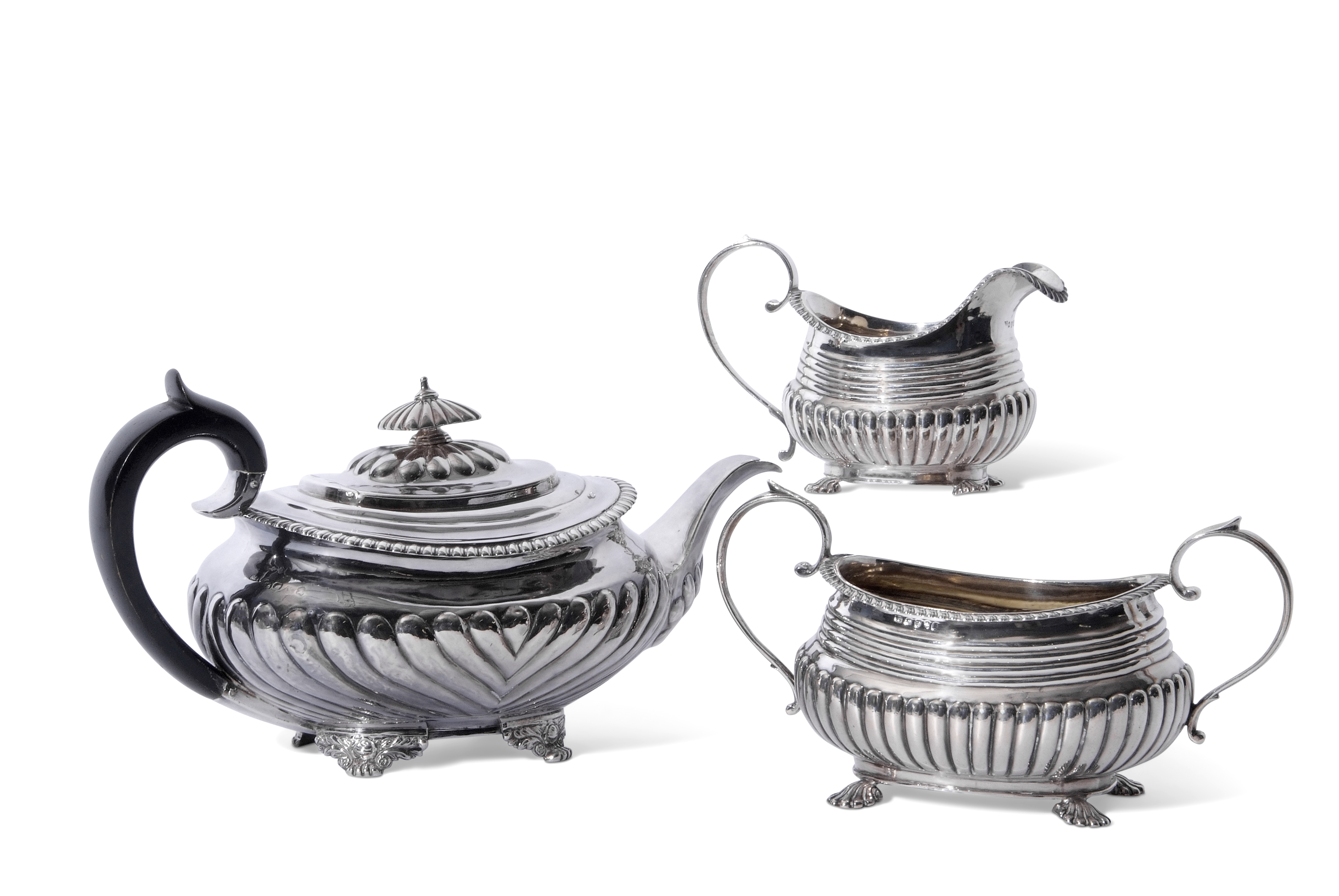 Matched George III/IV tea set comprising tea pot of compressed oval form with gadrooned rim,