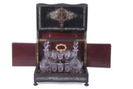 Victorian black lacquer and mother of pearl inlaid travelling decanter and glasses box containing