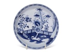 Large Lowestoft porcelain saucer with blue and white design of fence and flowering plants (ex-