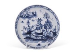 Lowestoft porcelain saucer with blue and white design of pagoda and islands within hatched border,