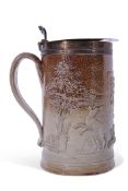 Large Mortlake (Kishere) tankard with plated rim and cover decorated with a square panel, possibly