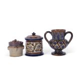 Group of Art pottery wares comprising a T Smith & Co two-handled vase, the buff background decorated