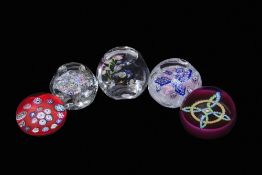 Group of paperweights including a Carlsthal weight inscribed 3/25, a Caithness Whitefriars Country