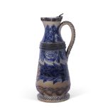 Smith & Co Art pottery jug with silver metal rim and cover, the body decorated with blue foliage and