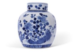 Chinese porcelain jar and cover with blue and white designs of flowers and birds, the cover with