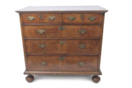 Late 17th/early 18th century walnut chest, the inlaid top over two short and three full width