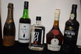 5 bottles inc Benedictine liquer, Sandeman port, Fine Old Ruby, Manx Spirit