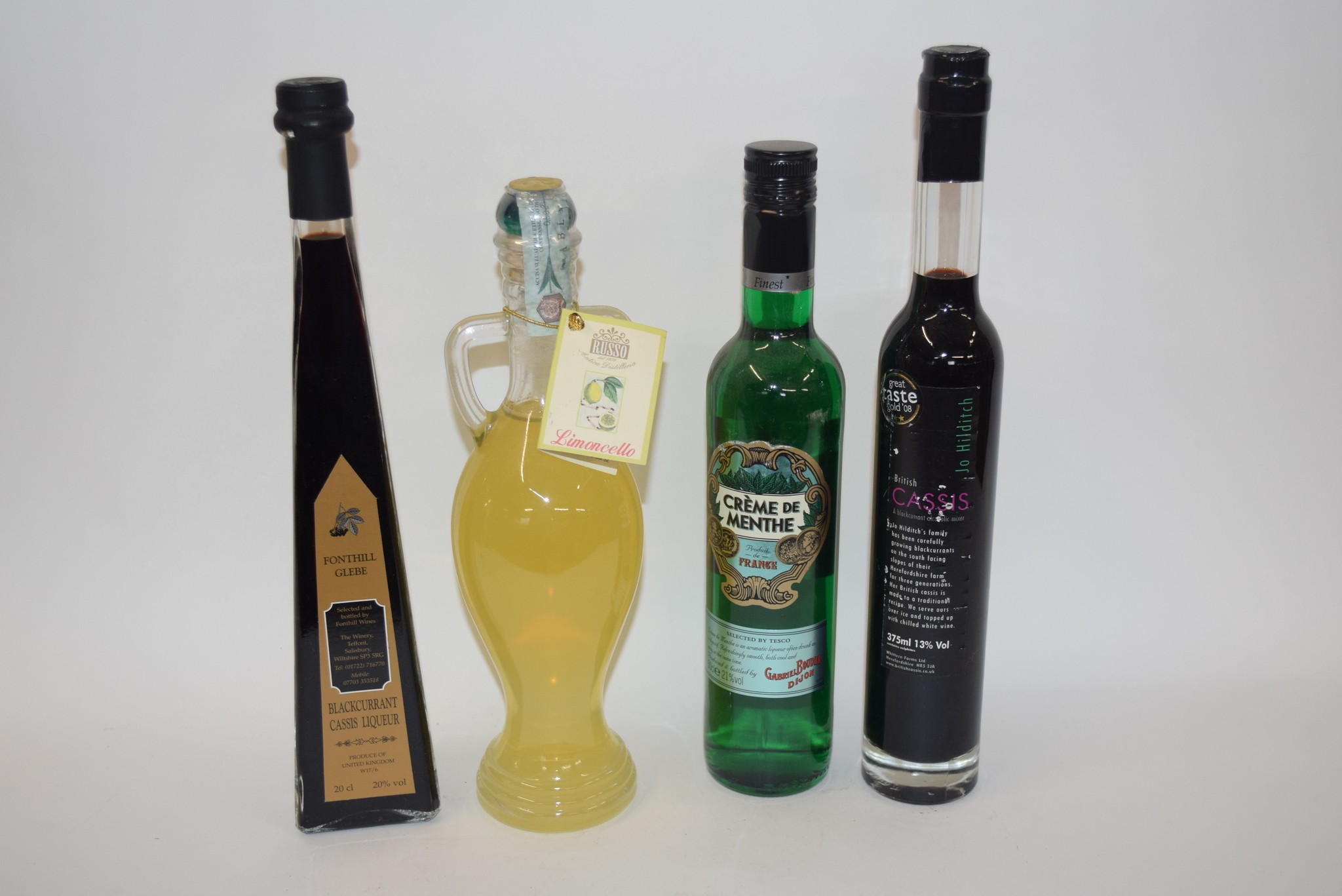 Mixed Lot: 50cl bottle Creme de Menthe (21%), 50cl bottle Limoncello and 20cl bottle of Blackcurrant