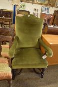 LARGE 19TH CENTURY GREEN UPHOLSTERED ARMCHAIR ON TURNED HARDWOOD FRAME WITH X-FORMED STRETCHER,