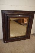 LARGE SQUARE WALL MIRROR IN A CARVED DARK STAINED WOODEN FRAME 81CM WIDE