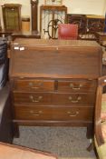 EARLY 20TH CENTURY MAHOGANY BUREAU WITH FITTED INTERIOR OVER TWO SHORT AND THREE LONG DRAWERS,