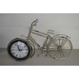 SMALL METAL MODEL OF A BICYCLE WITH CLOCK INSET TO FRONT WHEEL