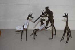 METAL MODELS OF GIRAFFES AND A HUNTER AND DOG