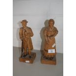 TWO CARVED WOODEN FIGURES OF A LADY AND A MAN
