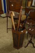 HEXAGONAL HARDWOOD STICK STAND WITH CANE SIDES CONTAINING MIXED WALKING STICKS